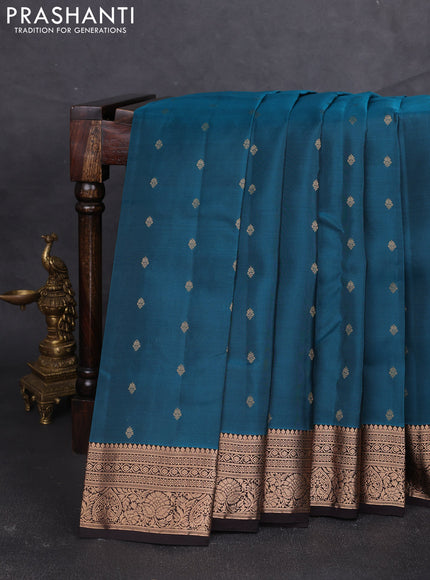 Kanchipuram silk saree peacock green and coffee brown with allover zari woven buttas and zari woven border