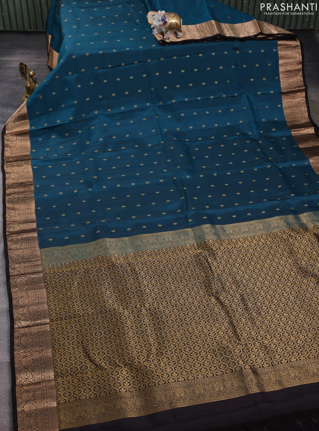 Kanchipuram silk saree peacock green and coffee brown with allover zari woven buttas and zari woven border