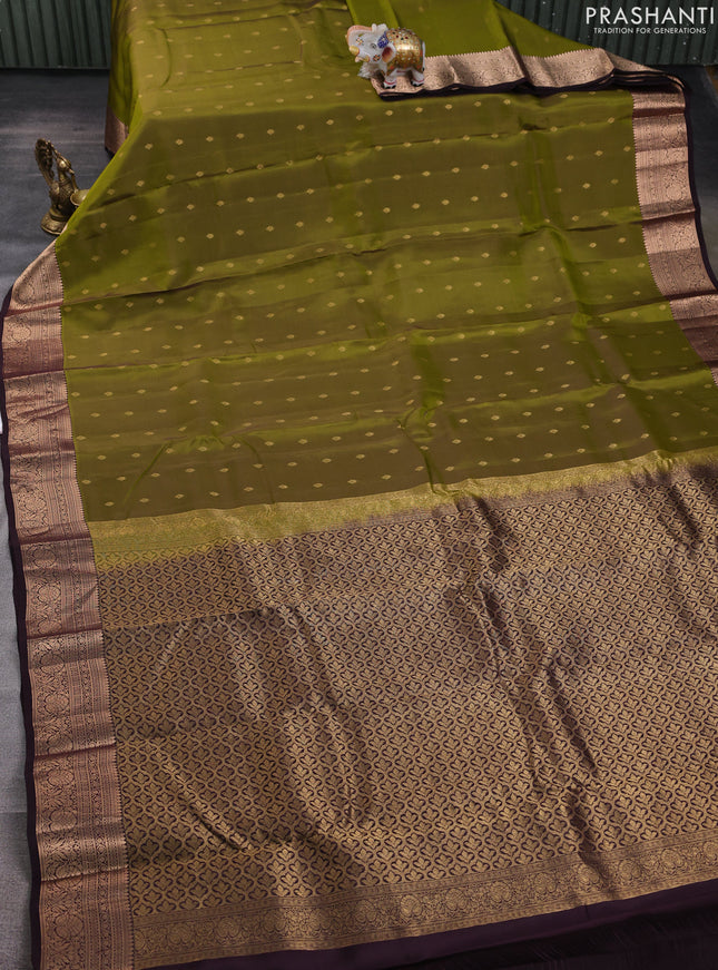 Kanchipuram silk saree mehendi green and coffee brown with allover zari woven buttas and zari woven border