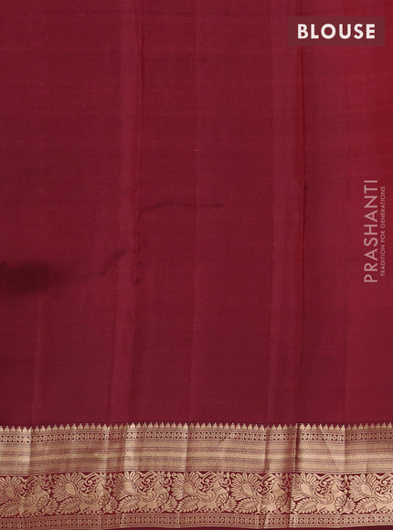 Kanchipuram silk saree orange and maroon with allover zari weaves & buttas and zari woven border