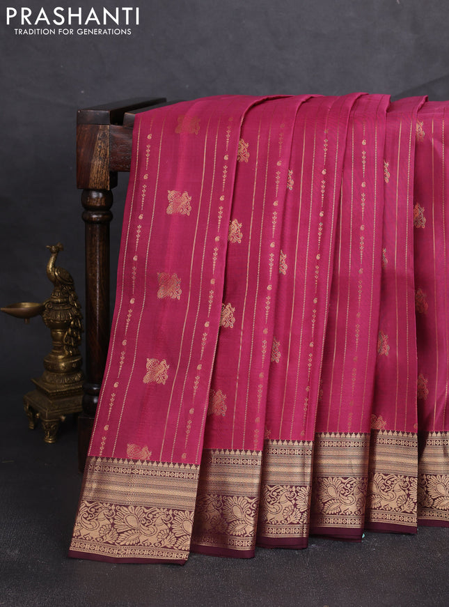 Kanchipuram silk saree pink shade and wine shade with allover zari weaves & buttas and zari woven border
