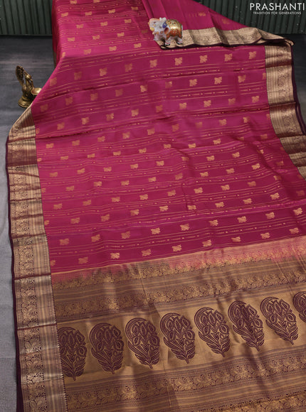 Kanchipuram silk saree pink shade and wine shade with allover zari weaves & buttas and zari woven border