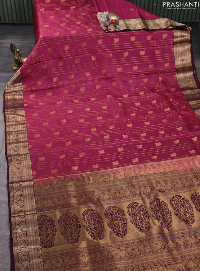 Kanchipuram silk saree pink shade and wine shade with allover zari weaves & buttas and zari woven border