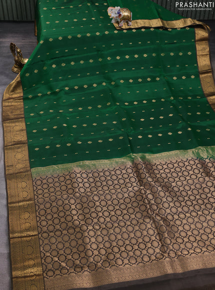 Kanchipuram silk saree green and olive green with allover zari woven buttas and zari woven border