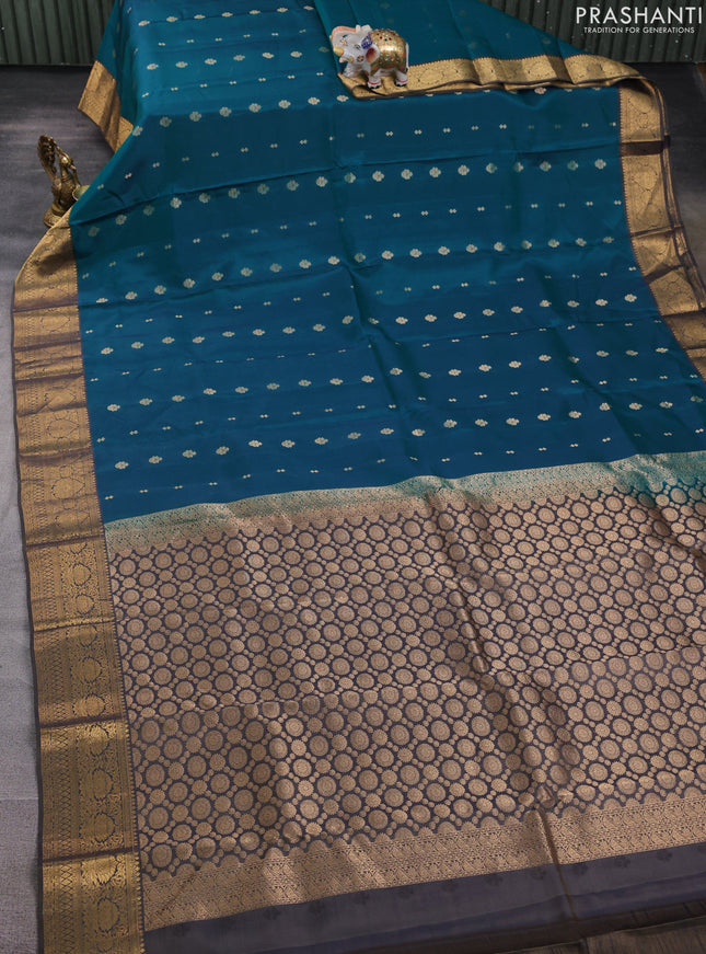 Kanchipuram silk saree teal green and olive green with allover zari woven buttas and zari woven border