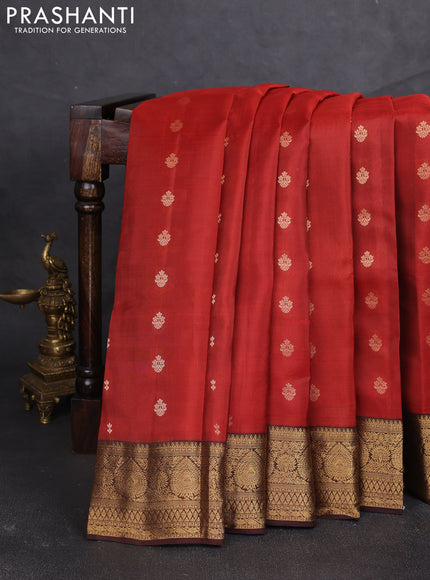 Kanchipuram silk saree rustic orange and coffee brown with allover zari woven buttas and zari woven border