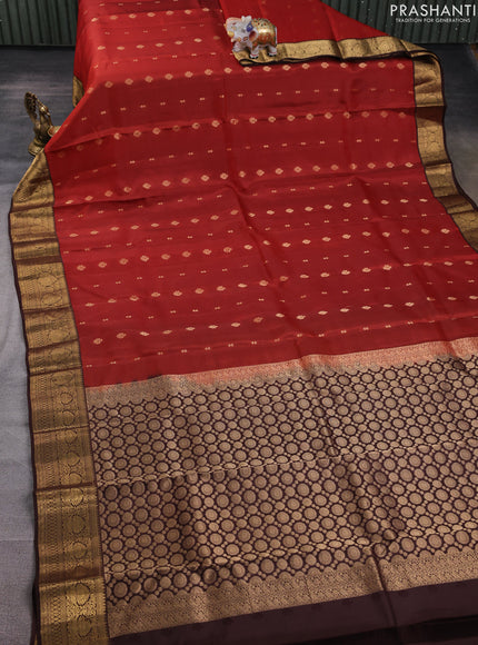 Kanchipuram silk saree rustic orange and coffee brown with allover zari woven buttas and zari woven border