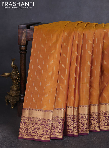 Kanchipuram silk saree dark mustard and wine shade with allover zari woven buttas and zari woven border