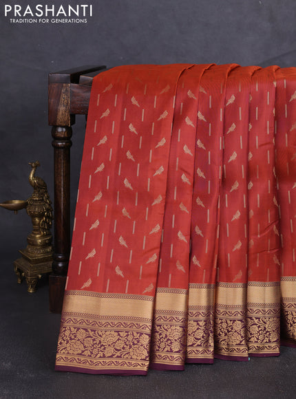 Kanchipuram silk saree rustic orange and wine shade with allover zari woven buttas and zari woven border