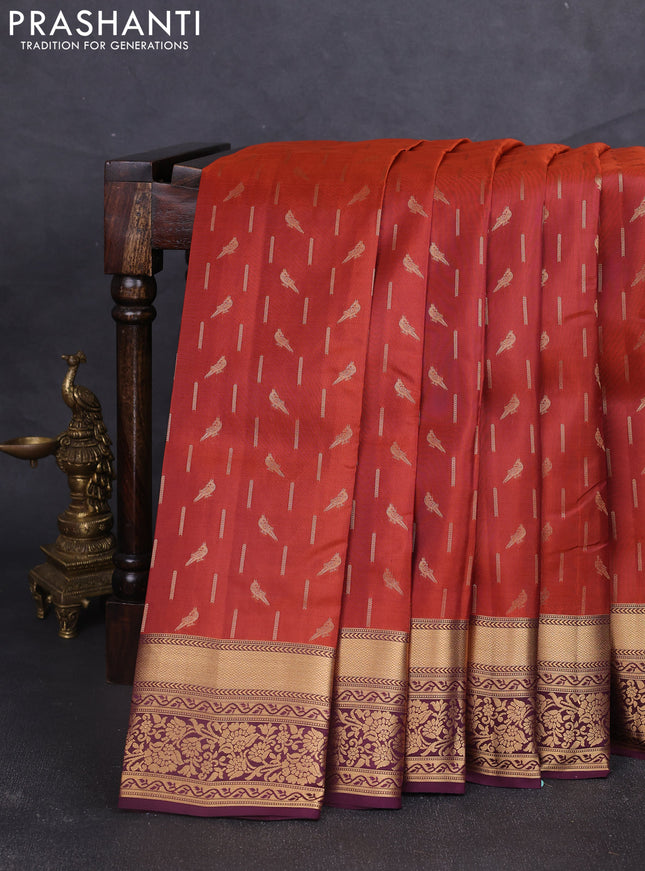 Kanchipuram silk saree rustic orange and wine shade with allover zari woven buttas and zari woven border