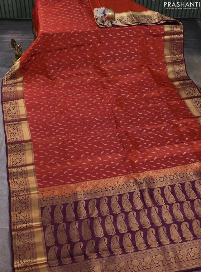 Kanchipuram silk saree rustic orange and wine shade with allover zari woven buttas and zari woven border