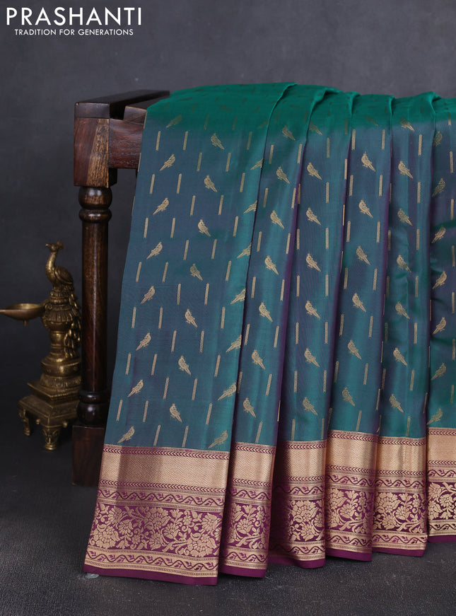 Kanchipuram silk saree dual shade of green and wine shade with allover zari woven buttas and zari woven border