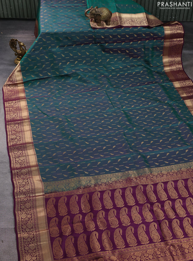 Kanchipuram silk saree dual shade of green and wine shade with allover zari woven buttas and zari woven border