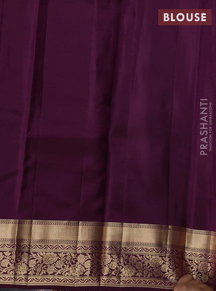 Kanchipuram silk saree dual shade of green and wine shade with allover zari woven buttas and zari woven border