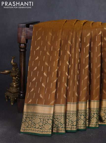 Kanchipuram silk saree dark mustard and green with allover zari woven buttas and zari woven border