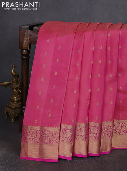 Kanchipuram silk saree light pink and pink with allover zari woven buttas and zari woven border