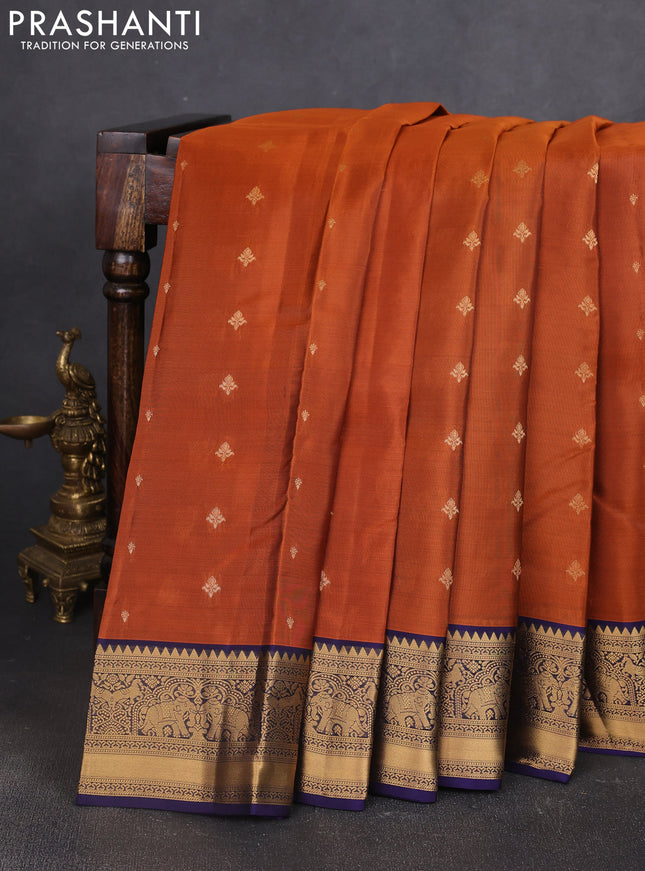 Kanchipuram silk saree rustic orange and navy blue with allover zari woven buttas and zari woven border