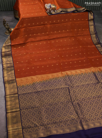 Kanchipuram silk saree rustic orange and navy blue with allover zari woven buttas and zari woven border