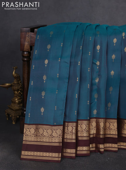 Kanchipuram silk saree peacock green and coffee brown with allover zari woven buttas and rettapet zari woven border