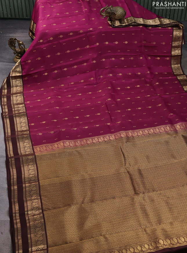 Kanchipuram silk saree wine shade and coffee brown with allover zari woven buttas and rettapet zari woven border