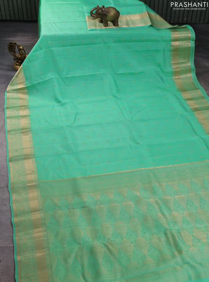 Kanchipuram silk saree teal green with allover zari woven buttas and zari woven border