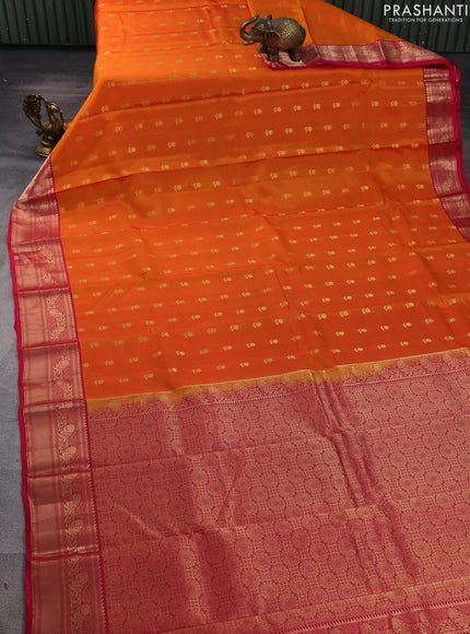 Kanchipuram silk saree orange and pink with allover zari woven buttas and zari woven border