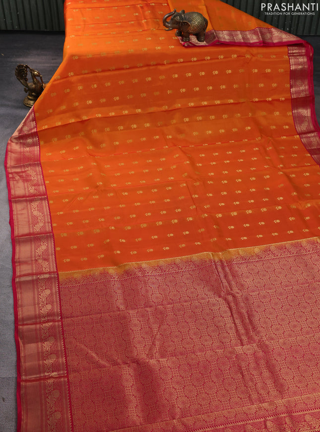 Kanchipuram silk saree orange and pink with allover zari woven buttas and zari woven border