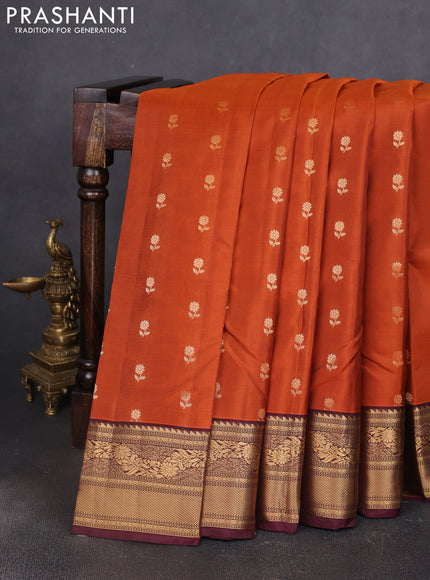 Kanchipuram silk saree rustic orange and wine shade with allover zari woven buttas and zari woven border