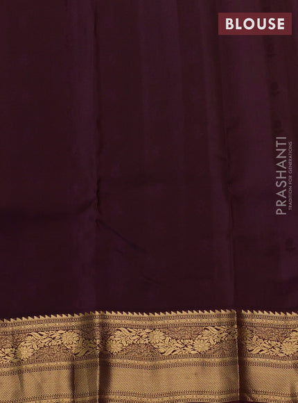 Kanchipuram silk saree rustic orange and wine shade with allover zari woven buttas and zari woven border