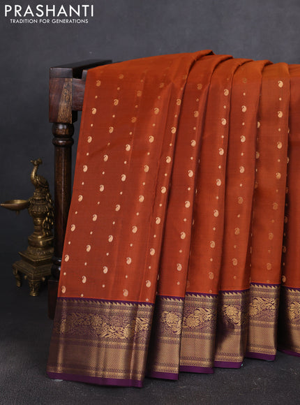 Kanchipuram silk saree rustic orange and purple with allover zari woven buttas and zari woven border