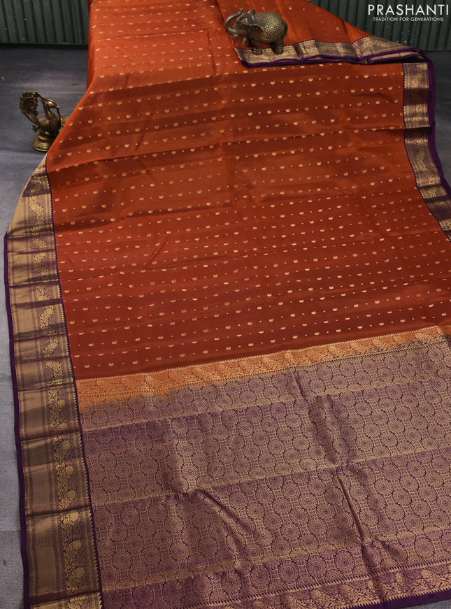 Kanchipuram silk saree rustic orange and purple with allover zari woven buttas and zari woven border
