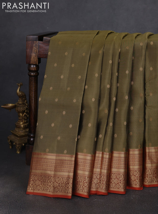 Kanchipuram silk saree olive green and rustic orange with allover zari woven buttas and zari woven border