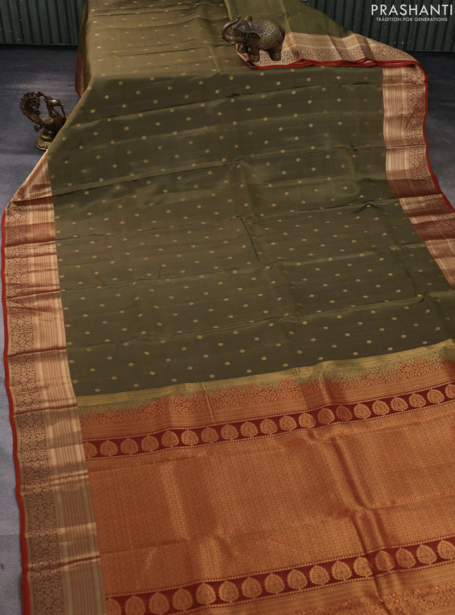 Kanchipuram silk saree olive green and rustic orange with allover zari woven buttas and zari woven border