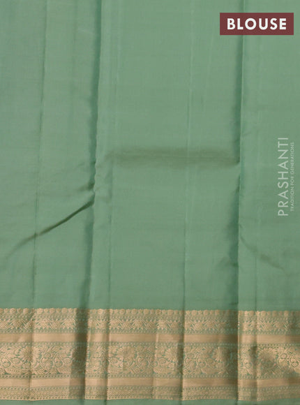 Kanchipuram silk saree pastel green with allover zari woven buttas and zari woven border