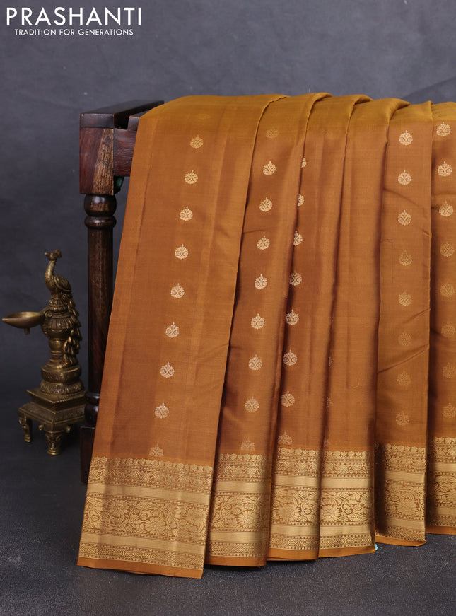 Kanchipuram silk saree dark mustard with allover zari woven buttas and zari woven border