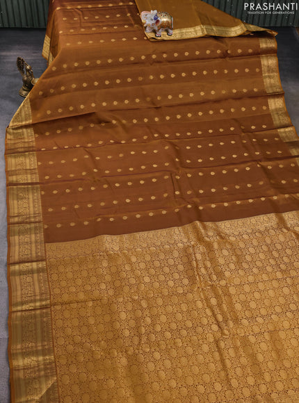 Kanchipuram silk saree dark mustard with allover zari woven buttas and zari woven border