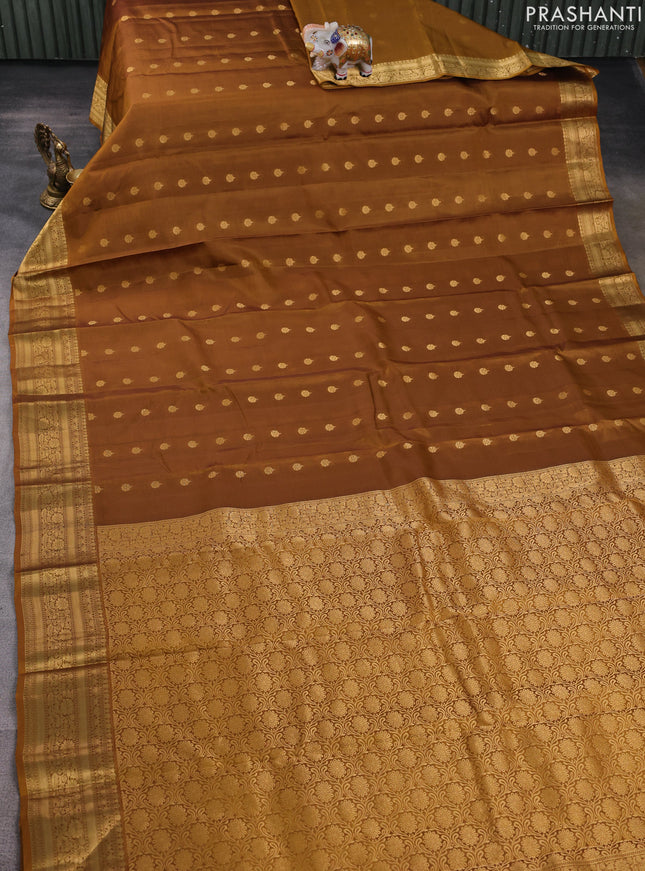 Kanchipuram silk saree dark mustard with allover zari woven buttas and zari woven border