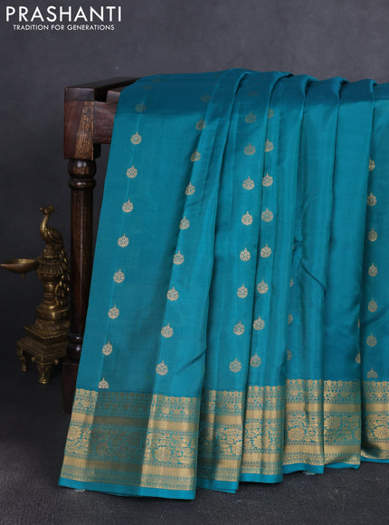 Kanchipuram silk saree teal green with allover zari woven buttas and zari woven border