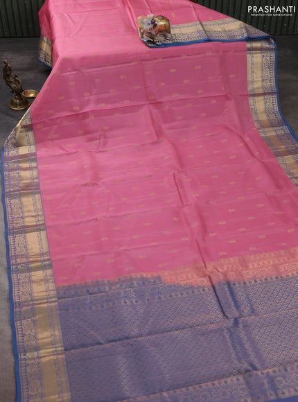 Kanchipuram silk saree light pink and teal blue with allover zari woven buttas and zari woven border
