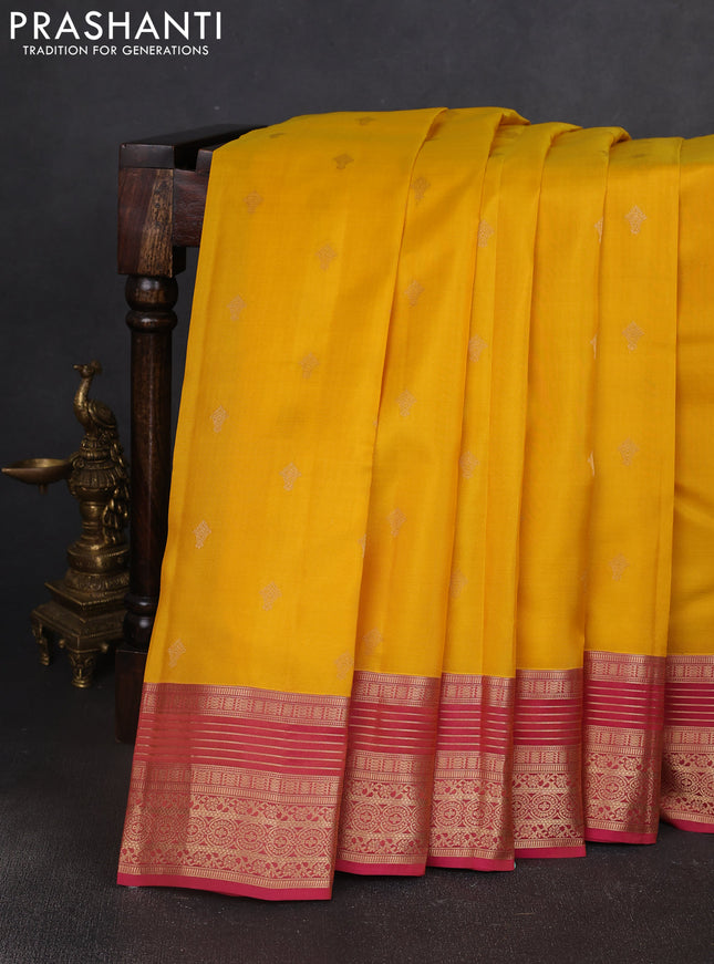 Kanchipuram silk saree yellow and pink with allover zari woven buttas and zari woven border