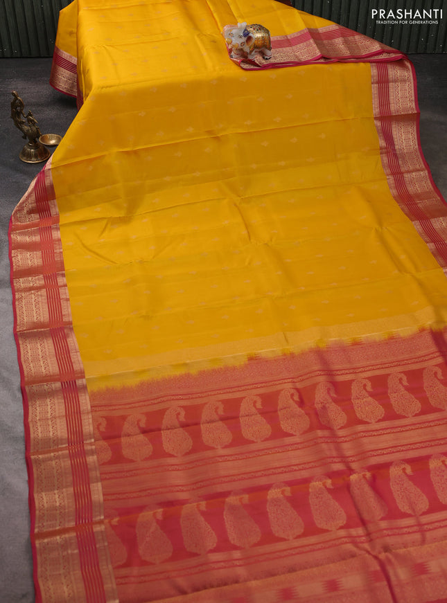 Kanchipuram silk saree yellow and pink with allover zari woven buttas and zari woven border