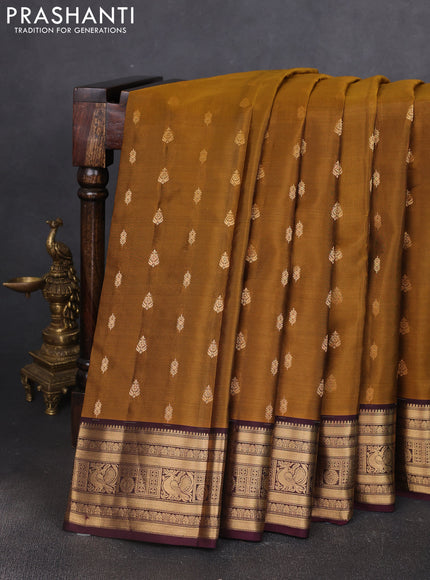 Kanchipuram silk saree dark mustard and wine shade with allover zari woven buttas and zari woven border