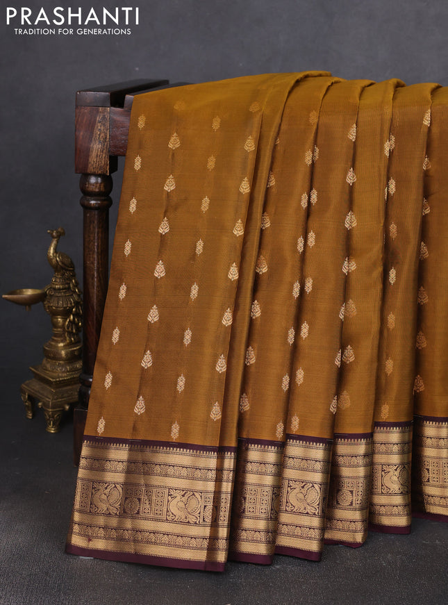 Kanchipuram silk saree dark mustard and wine shade with allover zari woven buttas and zari woven border