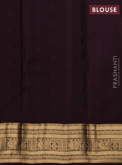 Kanchipuram silk saree dark mustard and wine shade with allover zari woven buttas and zari woven border