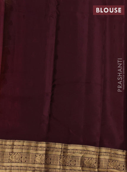Kanchipuram silk saree rustic orange and wine shade with allover zari woven buttas and zari woven border