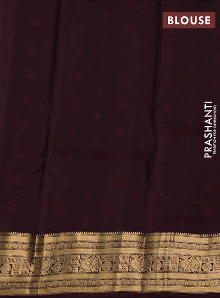 Kanchipuram silk saree peacock green and wine shade with allover zari woven buttas and zari woven border