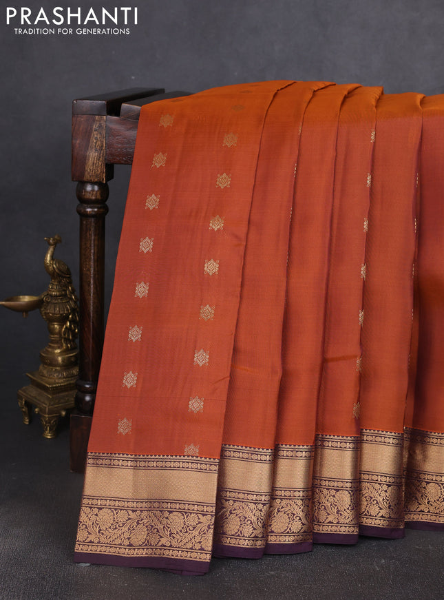 Kanchipuram silk saree rustic orange and coffee brown with allover zari woven buttas and zari woven border
