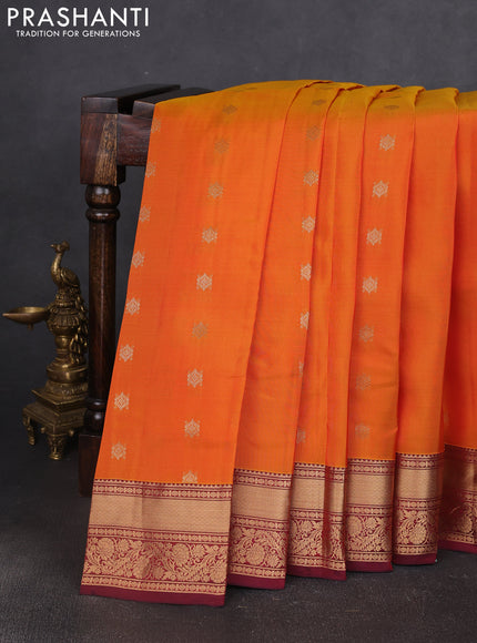 Kanchipuram silk saree orange and deep maroon with allover zari woven buttas and zari woven border