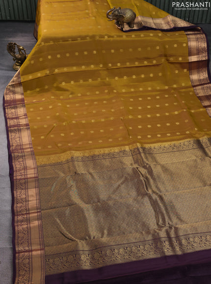 Kanchipuram silk saree mustard green and wine shade with allover zari woven buttas and zari woven border