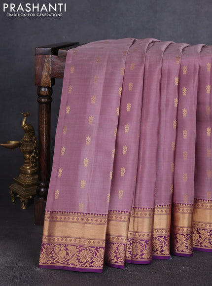 Kanchipuram silk saree pastel purple and purple with allover zari woven buttas and rich zari woven border